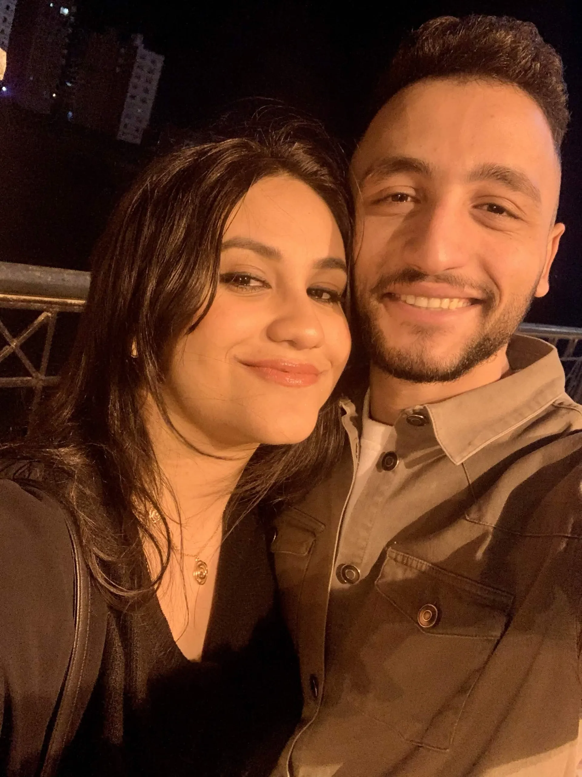 A warm close-up portrait of Muhammed and Merna